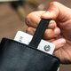 The wallet offers two pockets with pull tabs to access less frequently used cards.